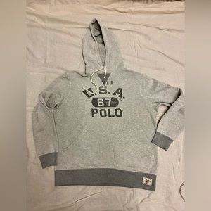 POLO SWEATSHIRT SIZE MEDIUM.